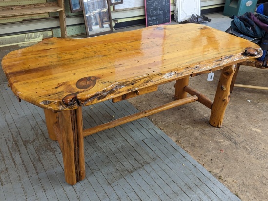 Attractive Northwoods style table measures approx 6' x 3' x 30" tall. Lots of drawers, in pretty