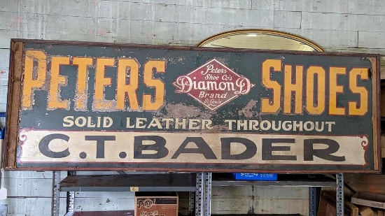 Historic antique sign once advertised Diamond Brand Peters Shoes back when C.T. Bader was proprietor