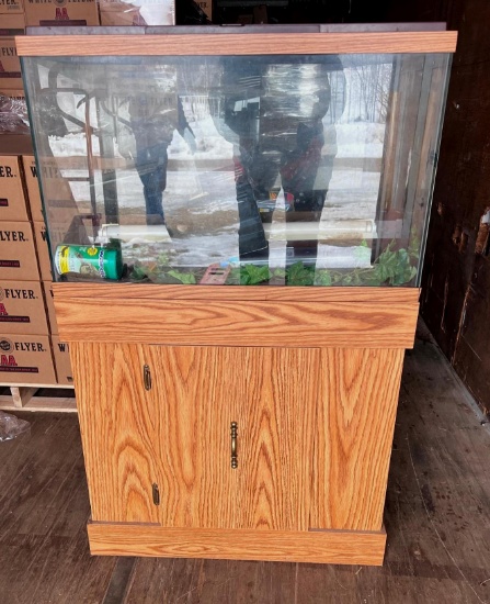 Large Aquarium with wooden cabinet base stand and accessories. Tank is 30"L X 12"W X 16" H. Stand is