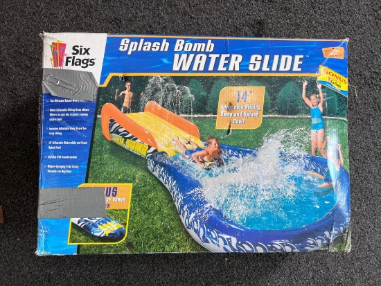 Six Flags Water Slide Splash Bomb. 14' inflatable slide and splash pool. Looks unused