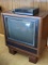 Vintage GE swiveling television set with wooden cabinet powers up and volume works. Philco VHS
