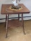Antique spindle leg table has ball and claw feet, top is 23