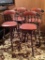 Four bar stools with upholstered seats and trim, 31