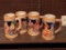 Four beer steins in good shape, each is approx. 5-1/2