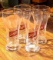Four Schlitz beer glasses, each about 7 oz. Classic pieces.