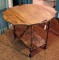 Charming drop leaf side table is about 29