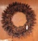 Wonderful pinecone wreath is about 2' wide and in good condition.