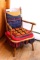 Vintage wooden side chair with handmade cushions. Chair is pretty sturdy.