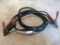 Approx 12' long jumper cables in good condition with good rubber on the leads, and solid heavy