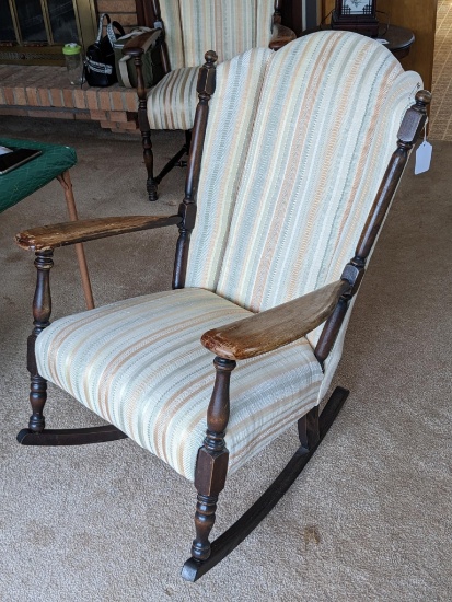 Comfortable vintage rocking chair has been reupholstered; measures 28" x 30" x 38". Upholstery