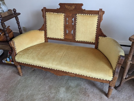 Vey retro loveseat is in nice condition. One small piece of trim on back is loose, but could easily