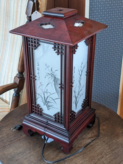Oriental style lamp is in good condition, works. Stands about 17".