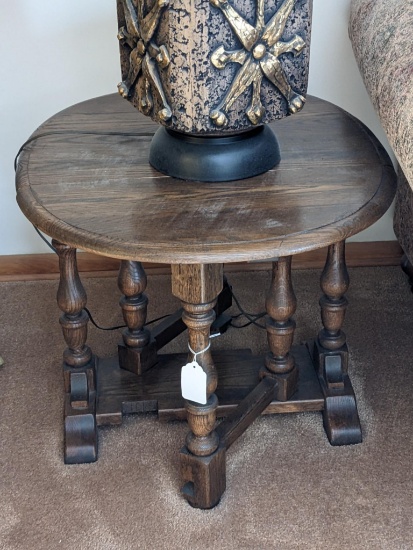 Adjustable end table with two folding sides; top measures 9-1/2" - 29" x 23-1/2" x 21" tall. Wooden