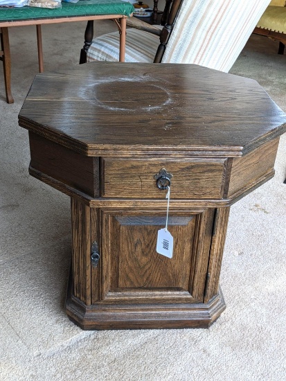 Wooden end table with drawer and door; measures 24" x 23" tall. Has a nice place for storing games.