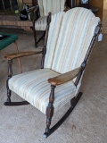 Comfortable vintage rocking chair has been reupholstered; measures 28