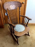 Antique rocking chair is in good condition overall. Measures 14