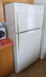 Maytag almond colored refrigerator in good working condition. Measures 66