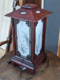 Oriental style lamp is in good condition, works. Stands about 17