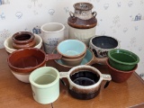 Small crocks and small stoneware bowls and more; largest bowl measures 5