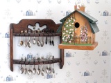 Spoon rack with two tiers of spoons and a bird feeder; spoon rack measures 13-1/2
