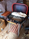 Meco charcoal grill in great condition. Side table folds down, has been stored inside, adjustable
