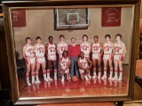 Framed photo of the Leopard's basketball team mostly likely mid-1970s. Measures 22