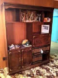 Nice cabinet with tons of storage stands nearly 6-1/2' tall and is 5' wide x 16