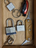 Three Master padlocks, all with keys (we found the missing one), sunglass visor clip, key pouch