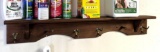 Bring tools to remove. Wall mounted coat rack with trinket shelf is 3' wide.