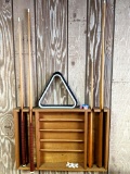 Bring tools to remove from wall. Pool cue wall rack, two ball racks, chalk, four cues up to 52