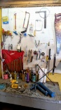 Wall of tools incl. Diamalloy slip joint pliers, caulk guns both large and small, Barcalo wrench set