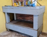 Metal topped work bench measures 22