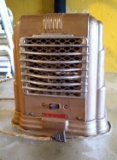 Vintage Arvin space heater. The heater is in good condition with a cool chrome grill, classic cord,