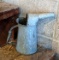 Cute galvanized oiler, stands almost 8' tall.