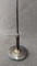 Desk top flag staff with weighted base appears the tone of silver plate.