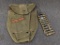 Belt of US Military Lake City brass, and a US Military canvas shovel head cover with leather trim