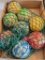 Bocce ball set has enough peeled paint to be charming.