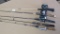 Four one-piece fishing rods with Zebco and other reels. Longest pole is 5'.