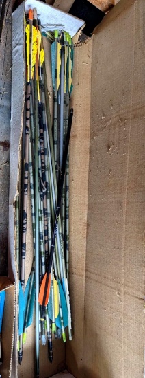 Two handfuls of Easton and other arrows and bolts. Some have broadheads.