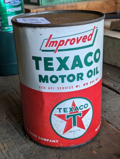 Texaco improved SAE 40 motor oil can with fantastic colors, a couple dents, and has been drained.
