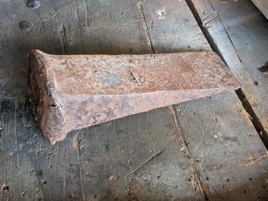 9" long splitting wedge, measures 3" at the back.