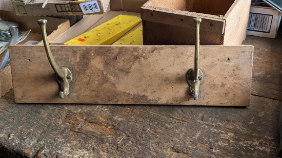 Adorable brass colored coat hooks, would look great in your entryway.
