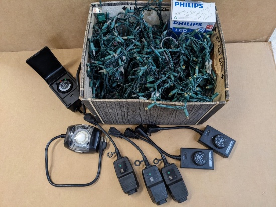 16" box filled with white Christmas lights, plus several timers.
