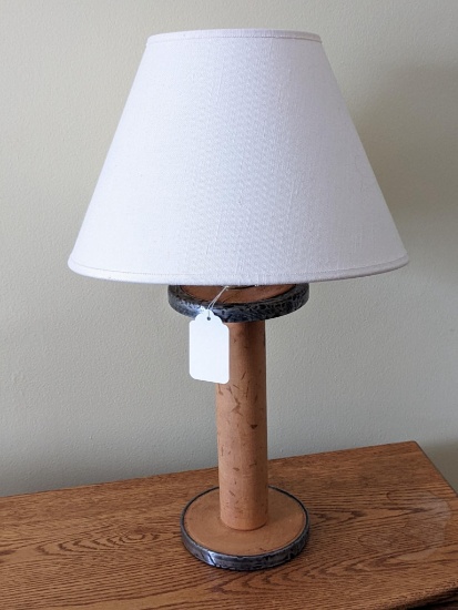 Neat table lamp made from an old wooden spool. Works and in good condition, about 20" over shade.