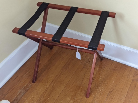 Nice suitcase or luggage rack is about 22" x 5" x 18" tall and in good condition.
