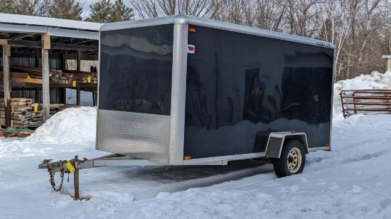 Aluma LTD 12' enclosed trailer with Bulldog jack, side door, and flip down aluminum ramp. Interior