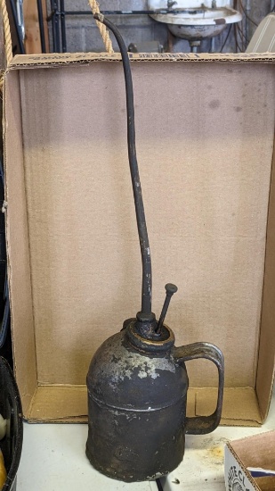 Oil bottle has a brass type ring around top and is 18" tall.