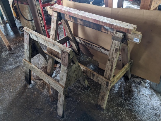 Two saw horses, larger measures 4' wide x 3' high.