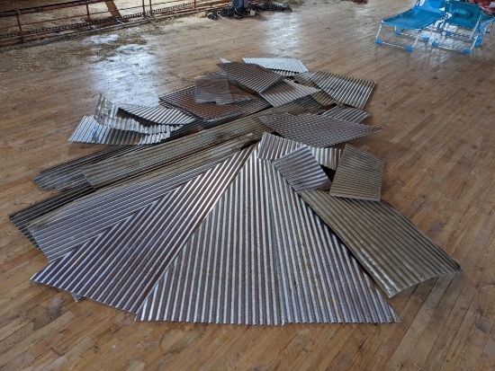 Upstairs, bring help. Corrugated aluminum scrapes of metal, great for crafting or repairs; longest