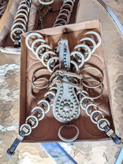 Upstairs, bring help. Horse bits and bridle pieces I think were for showing; longest piece measures